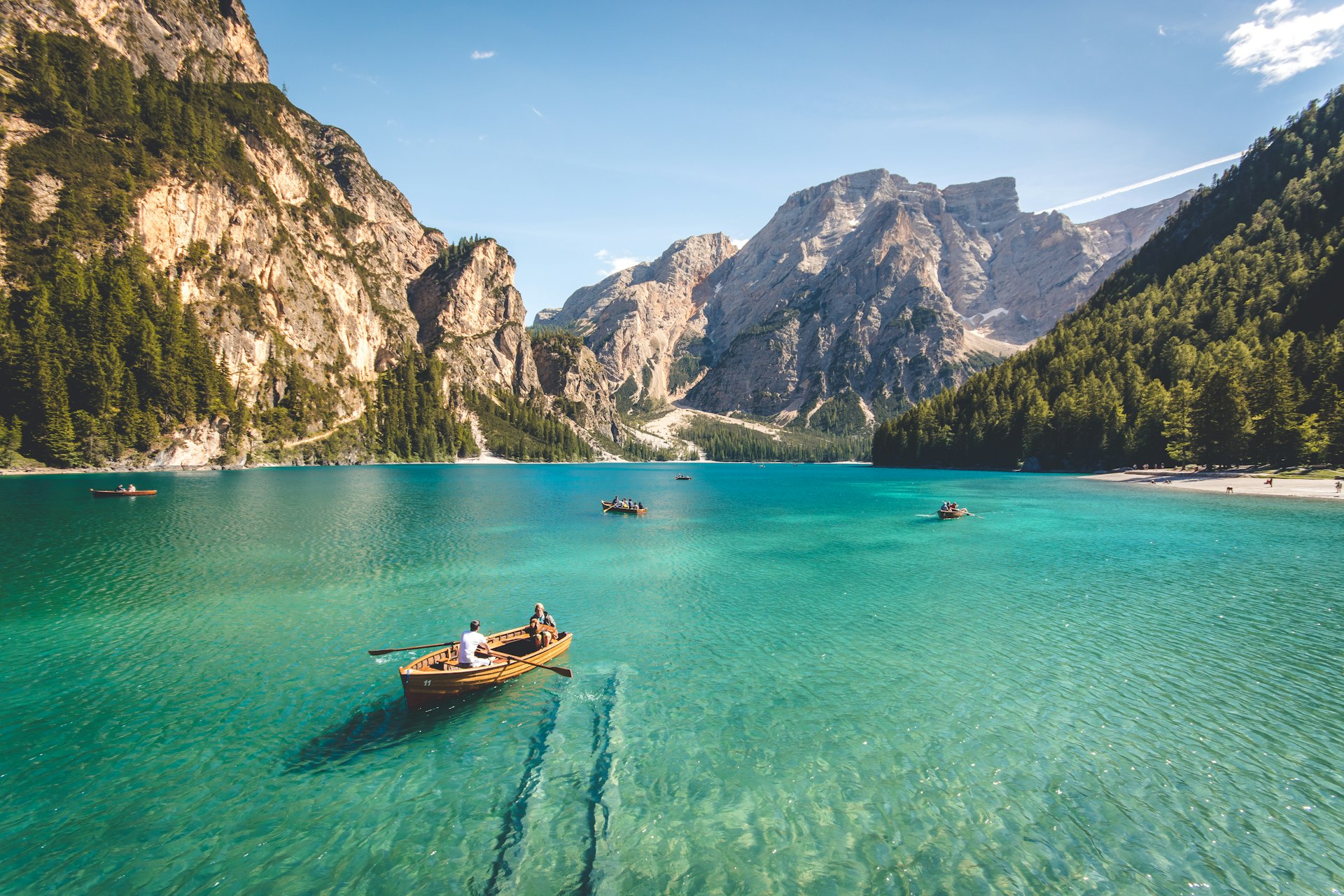Turquoise lake beneath rocky mountain peaks