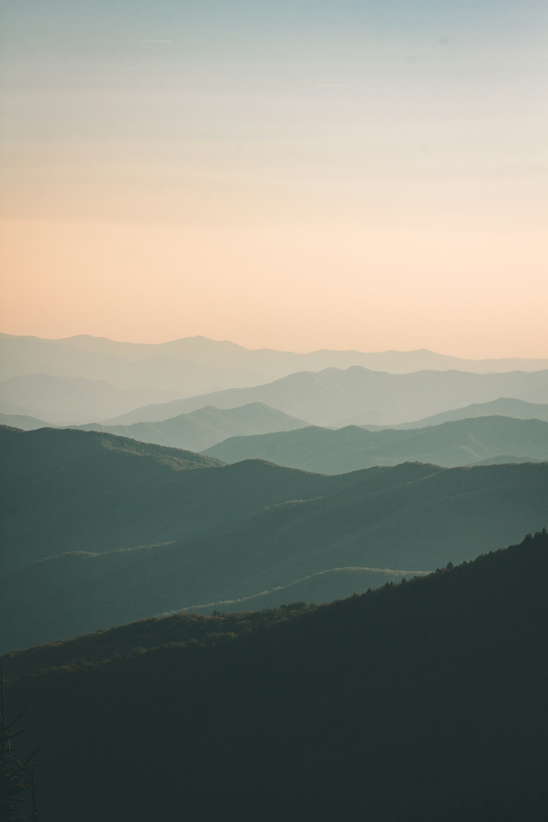Layered mountain ridges at dusk